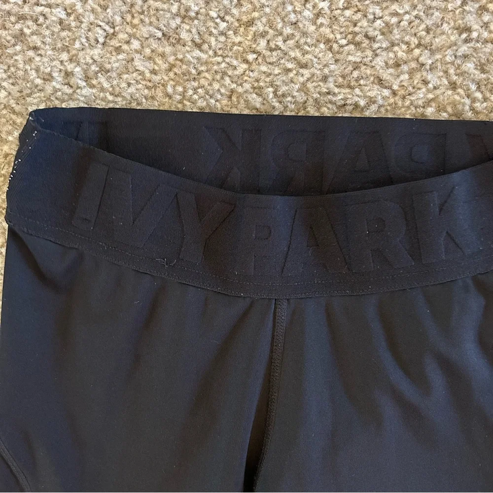 IVY PARK Leggings with Mesh and‎ Moto Detailing and Flip Belt Zipper Pocket
